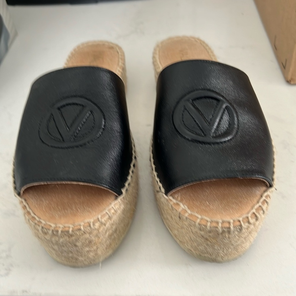 Valentino slides,black leather with logo,size 37.Very comfy.Excellent condition